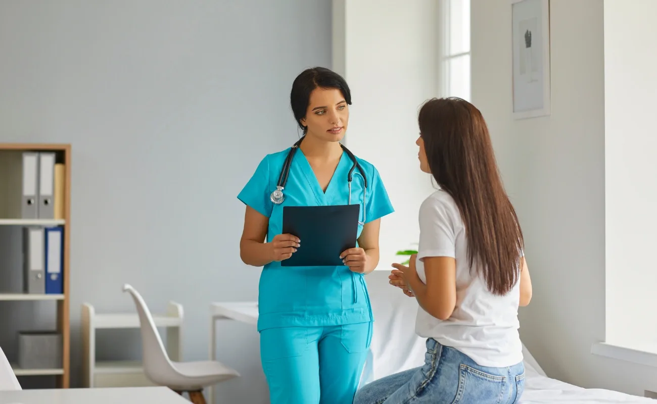 sick visit exam room consultation with primary care provider